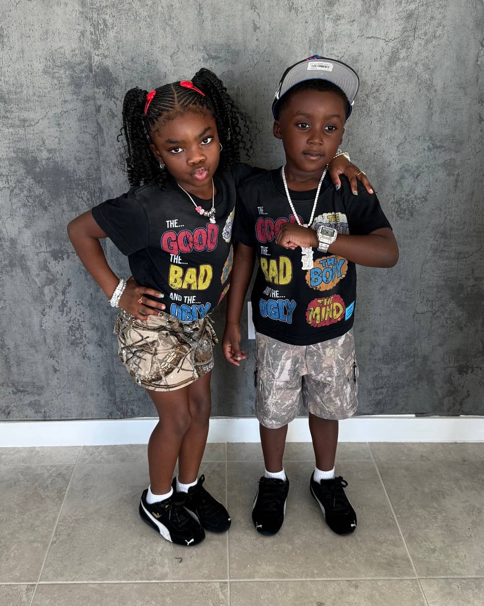 Two kids wearing the kids GBU tee in black